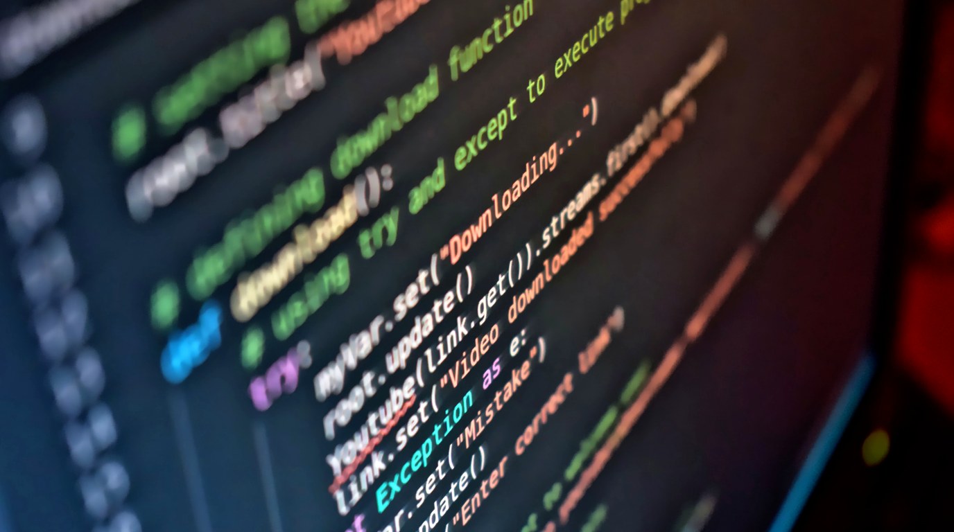 Nahaufnahme eines Bildschirms mit farbig hervorgehobenem Python-Quellcode