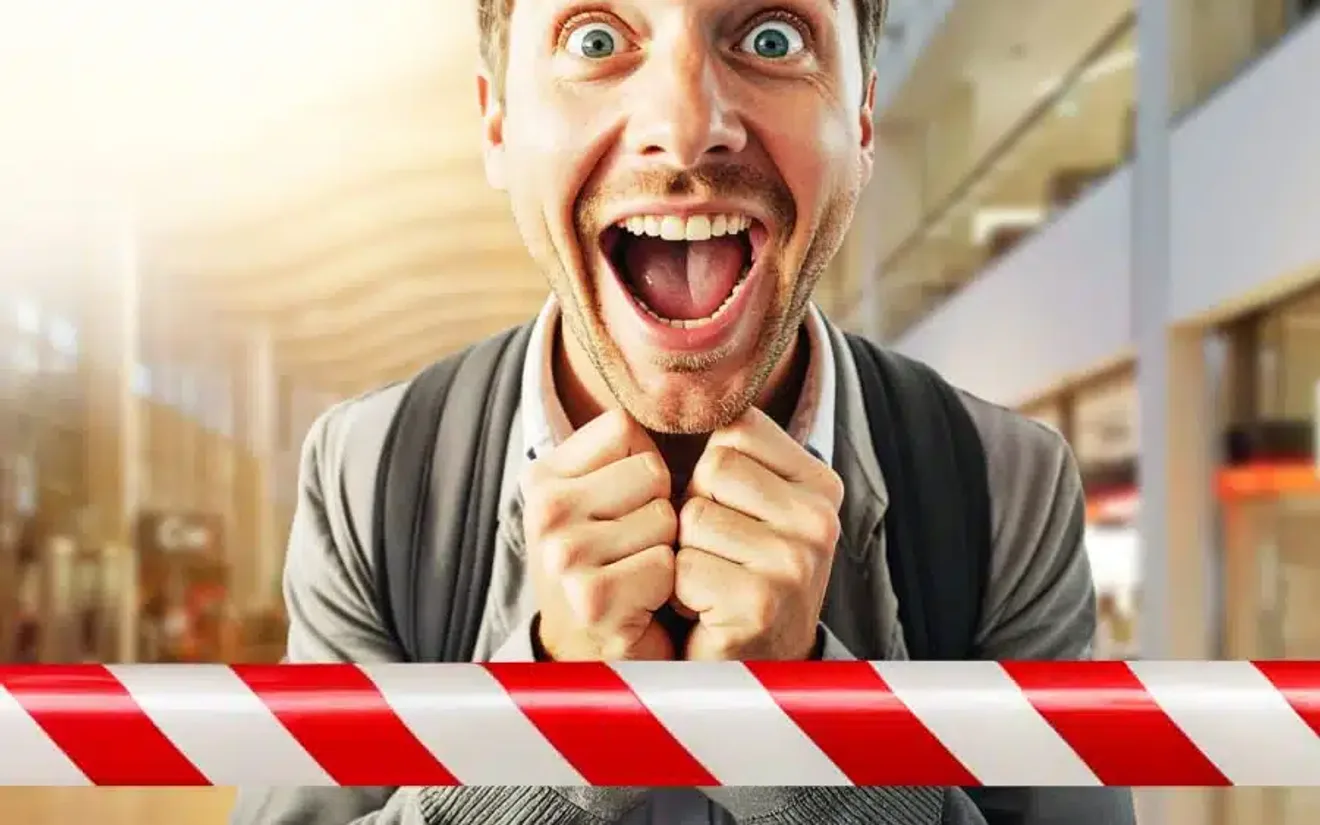 AI-generated campaign character reacting with excitement inside the Hamburg Airport terminal, behind red and white construction tape